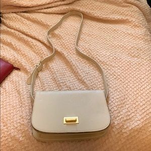 Tan cross body bag